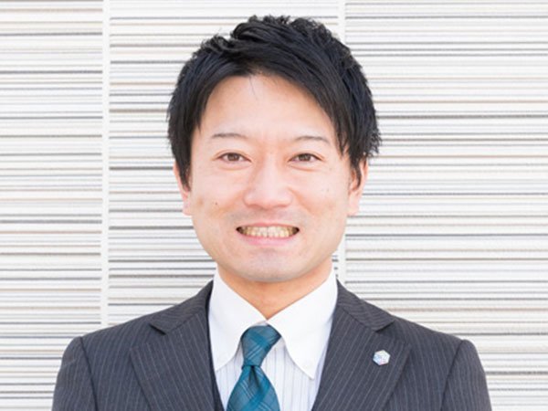 担当 関